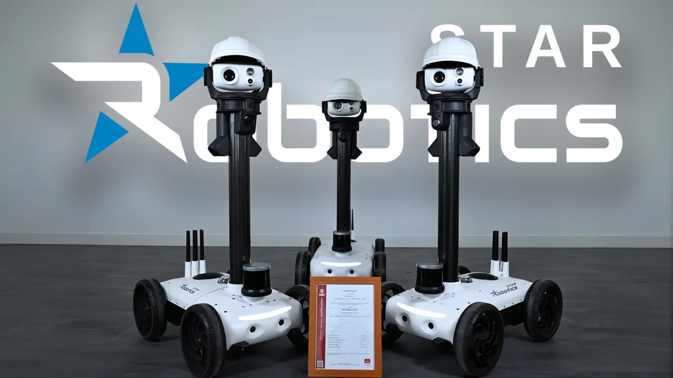 Three Watchbot robots beside the framed ISO 9001:2015 certificate, in front of the Star Robotics logo